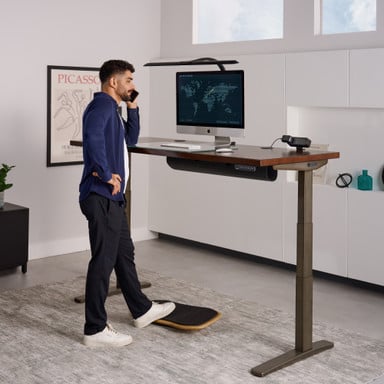 The Sliding Flex Lamp illuminates a wide area for glare-free, optimal task lighting