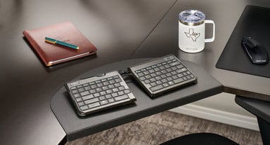 Add a keyboard tray to the inside corner of an L-Shape desk to add usable workspace