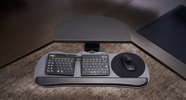 Mount a keyboard tray to a corner sleeve to position your keyboard and mouse at the perfect height, distance, and angle for optimal ergonomics
