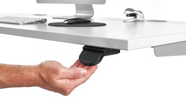 Lift the paddle to raise your standing desk and press down to lower it
