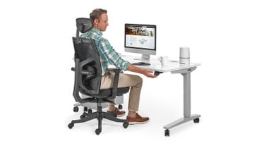 Double-tap the paddle up or down to automatically raise or lower your desk to saved heights
