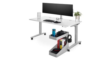Unidirectional casters allow the caddy to easily roll in and out from under desks
