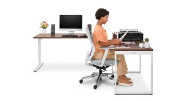Create an additional work area next to your standing desk