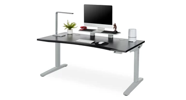 Use as an ergonomic monitor stand to boost the height of screens so the top is in line with your eyes for proper positioning