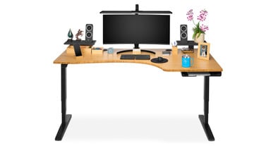 This corner desk maximizes the available workspace within your neutral reach zone