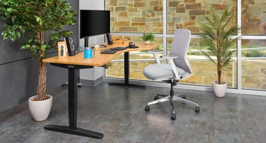 Bamboo 2-Leg Curved Corner Standing Desk with right return and a White Envoke Chair