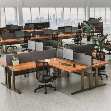 Seamlessly connect multiple L-shaped desks to maximize your office floor plan