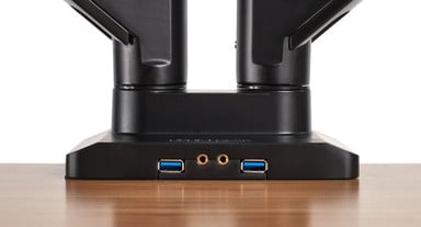 The Crestview Monitor Arm Wiring Kit adds two USB ports and audio jacks to the base of the monitor arm