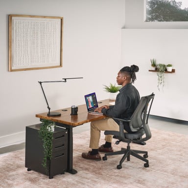 The UPLIFT V3 4-Leg Standing Desk adjusts to match your body, workflow, and space