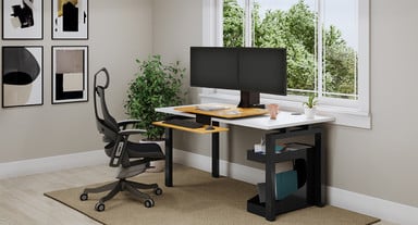 Pursuit Ergonomic Chair with Bamboo E7 Standing Desk Converter in seated position