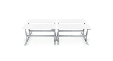 4 Desks benched together in alignment