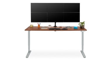 Moontower Six Monitor Arm clamped to the back edge of an 80" x 30" Walnut Laminate V2 Standing Desk