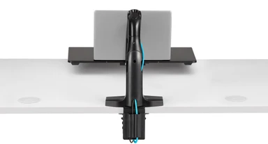 Use integrated cable management for a clean, organized desk