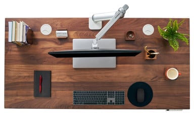 Free up valuable desk space by hovering your monitor over your desktop