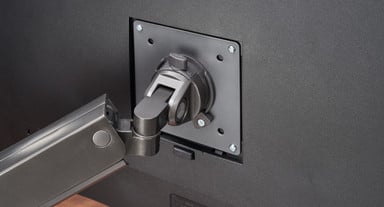 Standard 75mm and 100mm quick-release VESA mount with lock secures your monitor in place