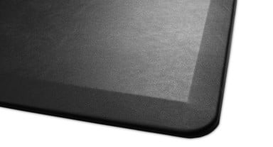 Stylish faux leather surface complements various spaces, like offices, kitchens, workshops, and salons