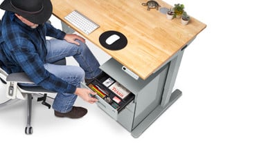 The file cabinet's top two drawers are soft-close and have 11 slots each to fit the included pencil tray 