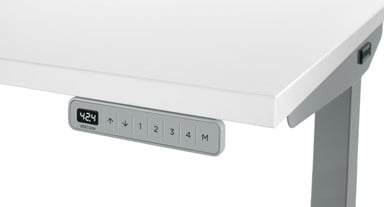 Keypad sits flush with the front edge of the desktop to avoid contact with objects in front of the desktop as the desk moves