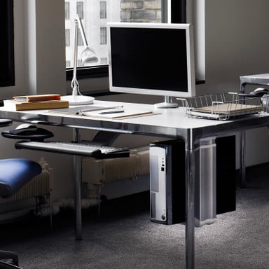 Protect your CPU from accidents by raising it off of the floor and by shielding it with the worksurface