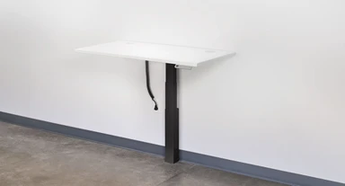 A coiled power cord and included adhesive backed cable ties improve aesthetics and keep the floor clear of tripping hazards and tangled cords
