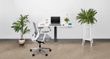 The elimination of desk legs resting on the floor below this desk for small spaces opens up the area below for floorspace savings