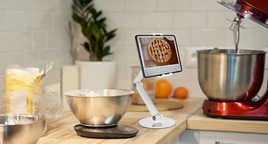 Keep hands free and recipes on display with the Adjustable Tablet Stand