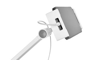 Molded opening in clamp allows access to charging ports