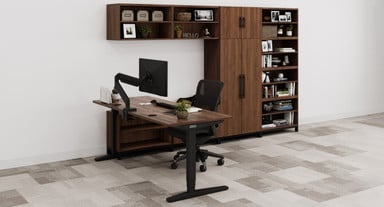 Walnut MoPac Storage Wall 4 configuration and matching Walnut Laminate UPLIFT Standing Desk