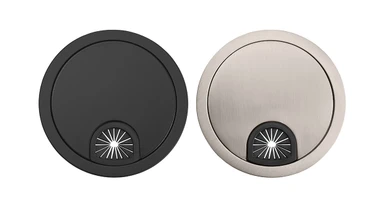 The Metal Grommet Cover is available in matte black and brushed nickel finishes
