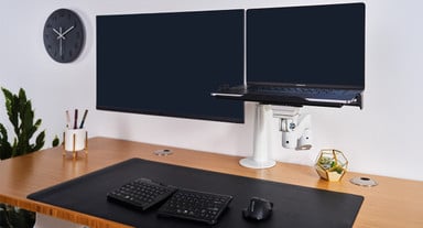 Free up valuable desktop space by elevating your laptop. Shown with a Range-X Dual Monitor Arm (sold separately)