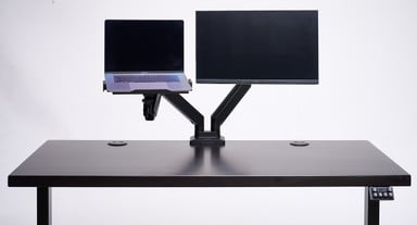 Compatible with most UPLIFT Desk monitor arms. Shown with Crestview Dual Monitor Arm