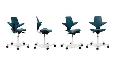 Capisco Puls with Fathom plastic, partially upholstered seat, and white base. Upholstery: Era Generation