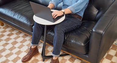 Wide, low-profile base fits under raised furniture like couches
