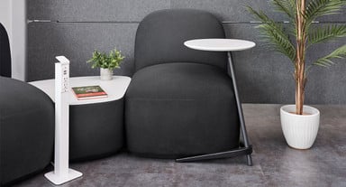 The Dillo Side Table's base fits around other Dillo pieces for optimal placement