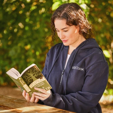 The Full Zip Hoodie by UPLIFT Desk brings cozy layers to quiet moments outdoors