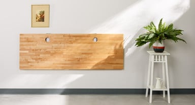 The UPLIFT Floating Desk saves valuable space by folding down and out of the way