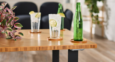 Water resistant & easy to clean, bamboo coasters protect desk and table surfaces from condensation rings - natural bamboo coasters shown