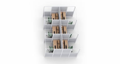 Dual-row Triple Cube Focus Spaces with white frames and split wall panels. 2-leg standing desks with 60” x 30” Birch Butcher Block desktops, Zilker Dual Monitor Arms, and Envoke Ergonomic Chairs in Sage green
