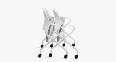 Seat folds up and chairs nest to save space