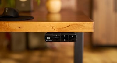 Save up to four sitting and standing heights and switch between them with a single touch
