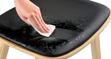 The resilient and ethical vegan leather is easy to clean and stands up to spills, perfect for high-traffic areas