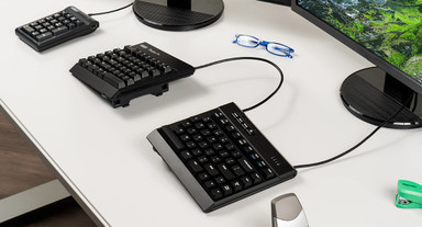 Kinesis V3 Accessory kit displayed in use with keyboard on desk