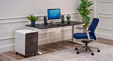 Modern home office featuring a file cabinet featuring gray laminate drawer fronts