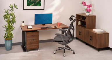 Modern office showcasing a full suite of UPLIFT Desk products, featuring the new drawer fronts for file cabinets