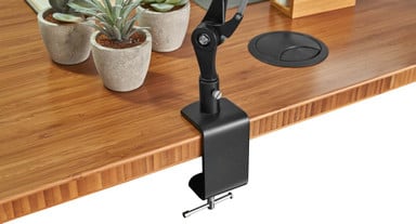 Mounts to desks up to 2.25" thick with the option to add a desk base
