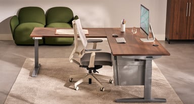 Side view of a Deep Desk Drawer integrated into an L-shaped standing desk, highlighting the matching frame finish