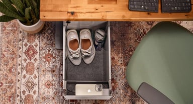 Deep and spacious drawer accommodates large objects including shoes, purses, and smaller backpacks