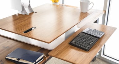 Eco-friendly bamboo adds a bit of zen to office spaces in need of height adjustability and style
