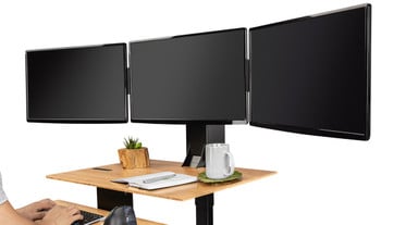 The E7 Electric Standing Desk Converter has options for one, two, or three monitors
