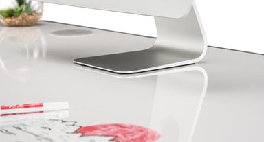 A closeup of our whiteboard laminate desktop